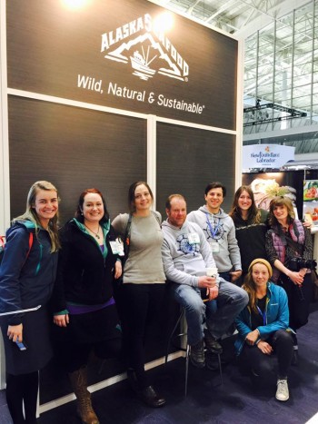 Fishermen from across Alaska on the Young Fishermen’s Educational Tour visit the ASMI booth at the Boston Seafood Show.
