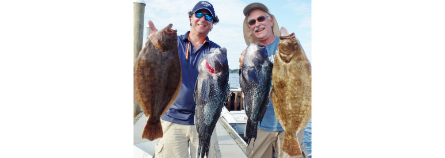 Steve Brustein of West Warwick and Kevin Fetzer of East Greenwich with summer flounder (fluke) and black sea bass they caught when fishing the Block Island Wind Farm area.