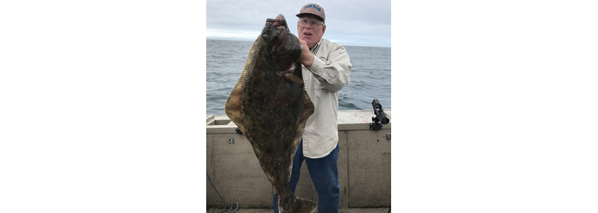 Captain Bill Kremers with a May 2018 Pacific Halibut from Newport, Oregon