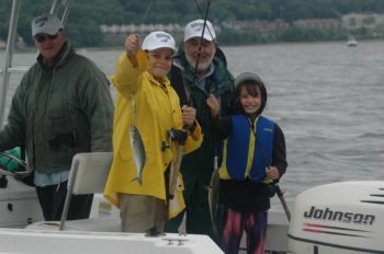 Ed Cook at the helm and mate Pete O’Biso, both long time RISAA volunteers, provided a great time for youngsters fishing on their boat during this year’s Take-a-Kid Fishing Day on Greenwich Bay.