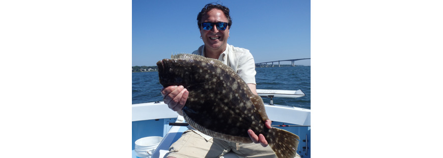 Steve Brustein of Portland, ME with a 23” summer flounder (fluke) caught last month north of the Jamestown Bridge in Narragansett Bay, RI.