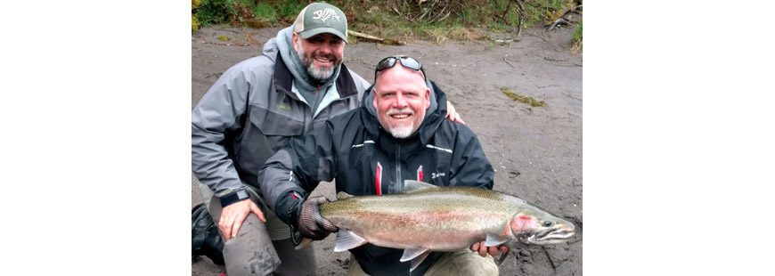 Guide Chris Vertopoulos (left) and client Jim Lorenz with a wild-released Sandy River steelhead from April 10, 2017