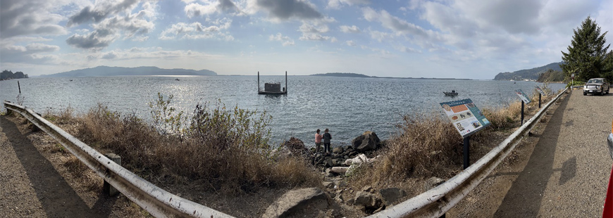 Panoramic shot of the "Ghost-Town-Hole" with just 4 boats plying the waters for salmon on Sunday, October 16th, 2022