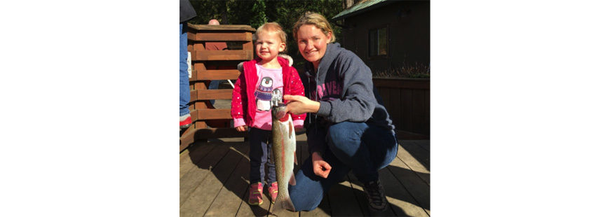 Two-year-old Haylee and mom Leeann Hubbard with Haylee's first trout