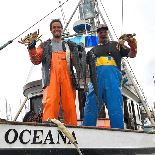 The crew of the F/V Oceana proudly display their catch, for sale to the public right off the boat at Woodley Island Marina in Eureka, California